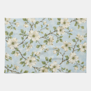 Sydlig blomsterdogwoodmönster på mjukt blått kökshandduk