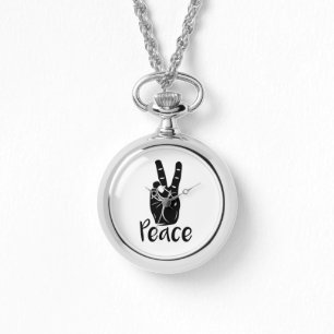 Symbolen räcker fredsteckenet med text "FRED", Armbandsur