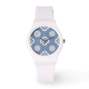 Symmetrisk Orange Flower Tiled Mönster på Blue Armbandsur