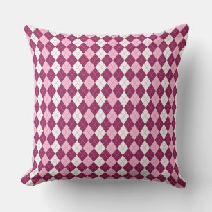 Symmetrisk rosa och vit argyle-design kudde