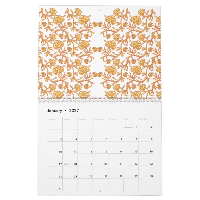 Symmetriskt blommönster med orangens motiv finns p kalender (Jan 2027)