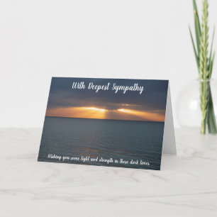 Sympati solnedgång över havet; ljus i mörk kort
