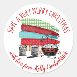 Syningssymboler för textilier som avger juldekal runt klistermärke