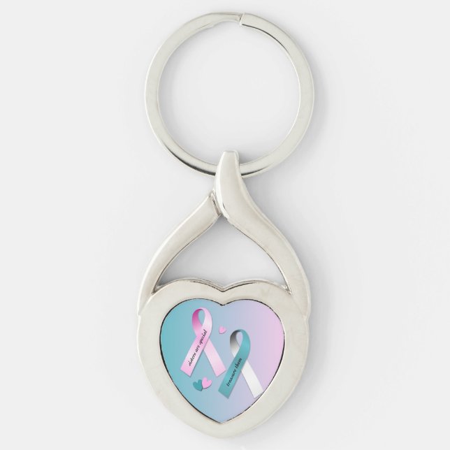 Systrar är speciella twisted heart silverfärgad nyckelring (Framsidan)