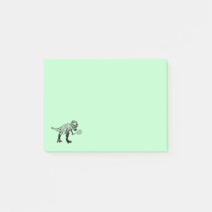 T-Rex dosinosaur med tennisracket på Grönt Post-it Block