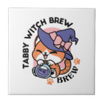 Tabby Witch Brew – Cute Halloween Cat Design Kakelplatta<br><div class="desc">Celebrate Halloween cuteness with this “Tabby Witch Brew” design featuring an adorable tabby cat wearing a purple witch hat with a pink bow, joyfully holding a bubbling magic potion. Perfect for cat lovers, witchy vibes, spooky season fans, or anyone who loves playful Halloween art. This kawaii design is great for...</div>