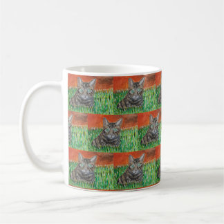 Tabbykatt i naturen kaffemugg
