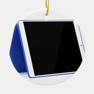 Tabletdator på vit julgransprydnad keramik