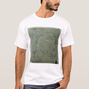 Tableten med kilskrift skrivar tee