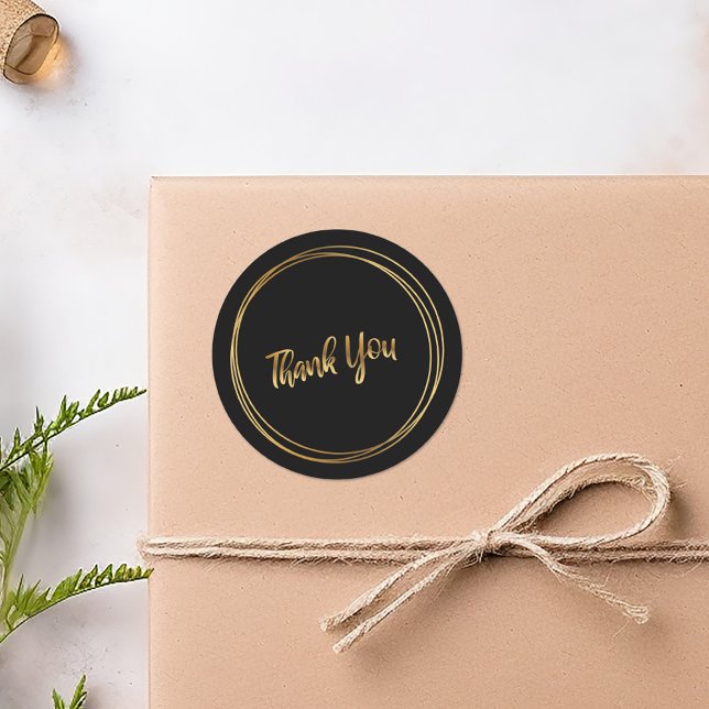 Tack guldringar svart runt klistermärke (Thank you gold rings black round sticker.)