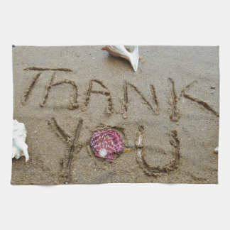 Tack i snäckor och strand. kökshandduk