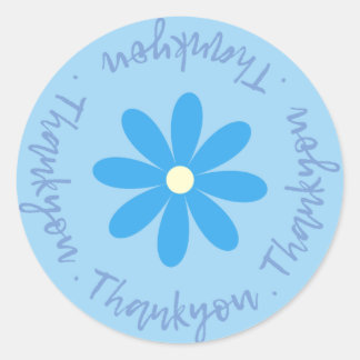 Tack med blomstermärke runt klistermärke