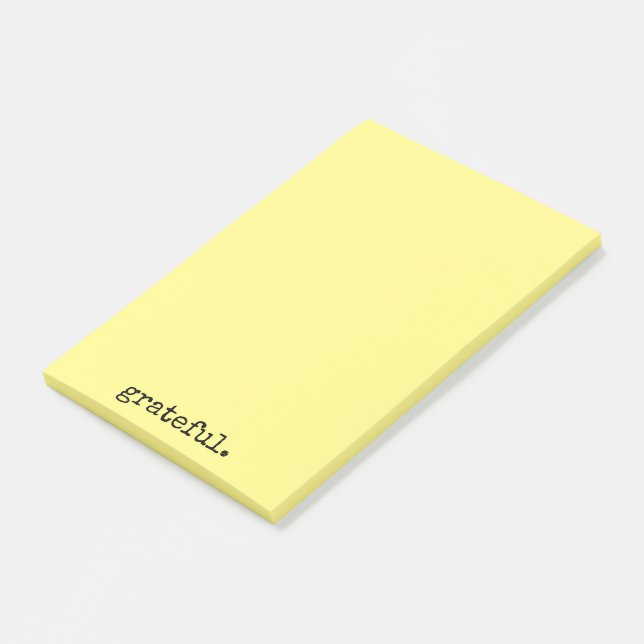 tacksam typografisk gult post-it block (Vinklad)