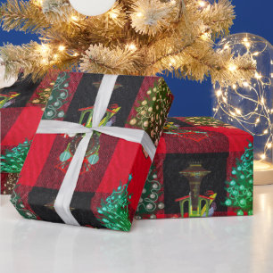 Tåg och julgranar på rutigt svart rött presentpapper