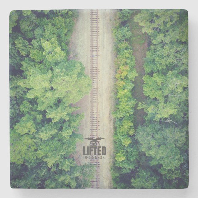 Tåg spårar underlägg sten (Framsidan)