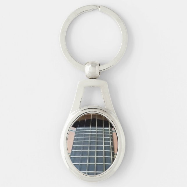 Takamin Fretboard Ovalt Silverfärgad Nyckelring (Framsidan)