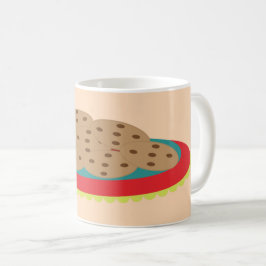 Tallrik med kakor kaffemugg