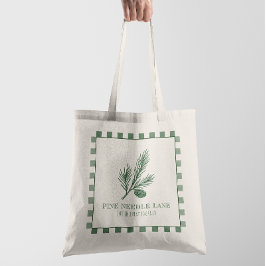 Tallrik med tallbarrsmotiv och gingham-kant tygkasse