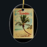 Tampa Handflatan Träd Vintage resor Julgransprydnad Keramik<br><div class="desc">En unik kopia av det moderna Tampa Florida-konstverket i vintage resor poster stil. Den har en böjd handflatan träd på sandstranden med hav under ett blått grumligt himlar.</div>