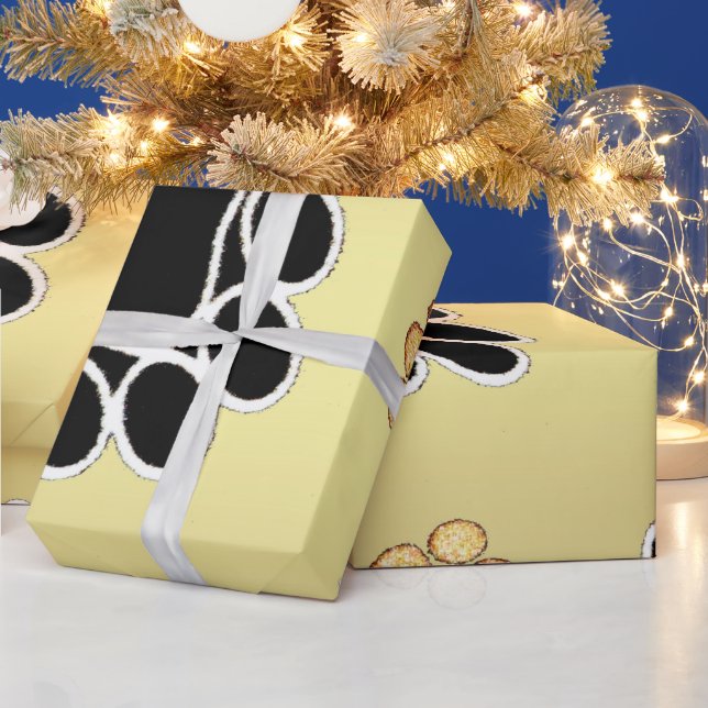 Tan- och svartfärgade utskrifter på guld-bakgrund  presentpapper (Helgdagar)