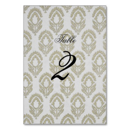 Tan och vit blocktryckt nummerskylt för bord bordsnummer