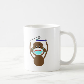 Tandläkaresock monkeyskjortor och kaffemugg
