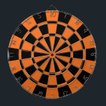 Tangerineorange och svart darttavla<br><div class="desc">Tangerineorangen och den svart pilen stiger ombord</div>