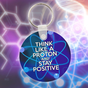 Tänk som en proton och håll dig positivt Roligt ci Nyckelring
