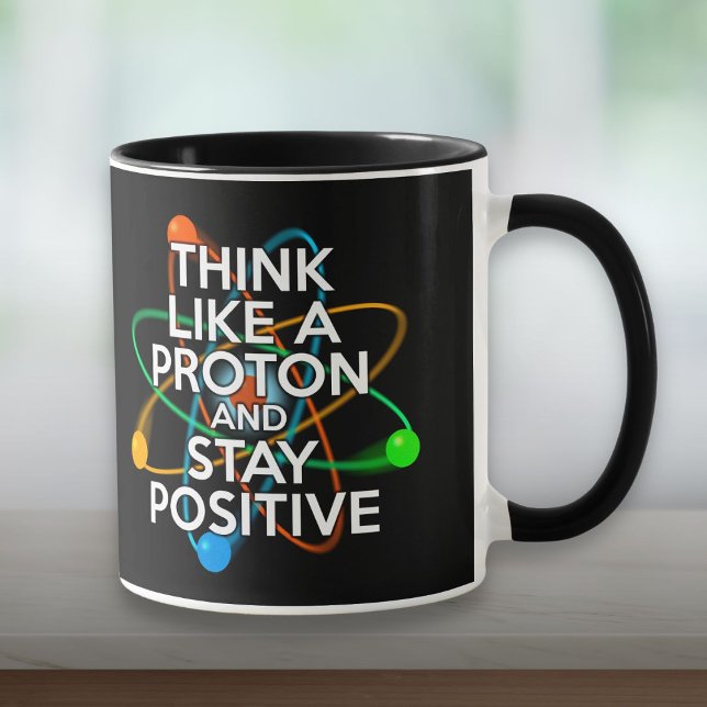 TÄNKA SOM ETT PROTON OCH STÄNG POSITIV MUGG (THINK LIKE A PROTON AND STAY POSITIVE MUG)