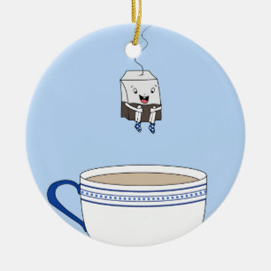 Tea hänger lös banhoppning i kopp julgransprydnad keramik