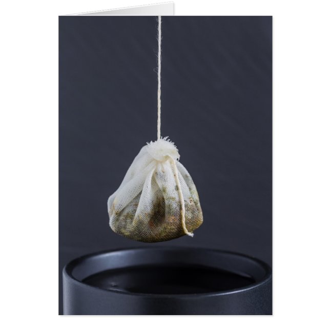 Tea-väskan hängs i kopp hälsningskort (Framsidan)
