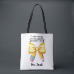 Teachers Change the World Personalized Tote Tygkasse<br><div class="desc">Carry everything you need with purpose and pride. This durable, roomy tote bag showcases the inspiring message “Teachers Change the World One Child at a Time, ” a daily reminder of your impact in every student’s life. Perfect for lesson plans, books, and everyday essentials, it can be personalized with your...</div>
