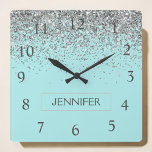 Teal Aqua Blue Silver Glitter Girly Monogram Namn Fyrkantig Klocka<br><div class="desc">Teal Aqua Blue och Silver Gnistra Glitter Monogram Namn Clock. Det gör perfekten söt 16-årsjubileum,  bröllop,  möhippa,  årsdag,  babydusch eller bachelorette-fest för någon som glam lyxen och chic stilar i kärlek.</div>