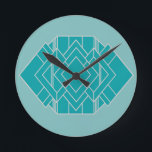 Teal Art Deco Quilt Inspired  Rund Klocka<br><div class="desc">Den här klockan har en konsdeco quilt-inspirerad design av diamantformer och en rektangel,  både i rial och silver,  på en fält av lättare teal.</div>