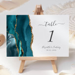 Teal Blue Guld Agate Bröllop Bordsnummer<br><div class="desc">Det moderna kortet för bordsnummer i bröllop,  som är lämnat kant i eleganten,  har en tårblått vattenfärgsagat i gräns som trimmas med faux guld glitter. Med anpassadet kombineras grått-handskrift,  kursiv och typsnitt på vit bakgrund.</div>