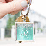 Teal Brushed Metall Silver Glitter Monogram Namn Fyrkantig Silverfärgad Nyckelring<br><div class="desc">Anpassa enkelt den här chicen av trendig-nyckelkedjan med söt silver mousserande glitter på en teal borstad metallbakgrund.</div>