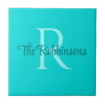 Teal Monogram Family namn Ceramic Tile Kakelplatta<br><div class="desc">Fin personlig med teal färg, anpassningsbar med inledande (monogram) och namn i familjen.</div>