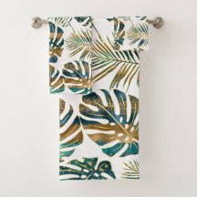 Teal och guld-plåstrade tropiska löv