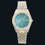 Teal Sissors & Monogram Armbandsur<br><div class="desc">Den här klockan innehåller ditt monogram och ett par saxar mot bakgrund av teal grönt,  med romerska siffror för guld-färgad. Det ger en perfekt till en hårfrisör,  hårstilist,  skräddare och mycket annat.</div>