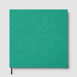 Teal textured surface with subtle swirling pattern gästböcker
