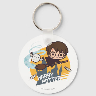 Tecknad Harry och Hedwig flygande förbi Hogwarts Nyckelring