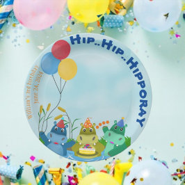 Tecknad Hippo som firar födelsedagen vid floden