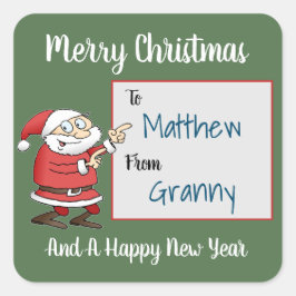 Tecknad Jultomten pekar på mottagare Namn Fyrkantigt Klistermärke