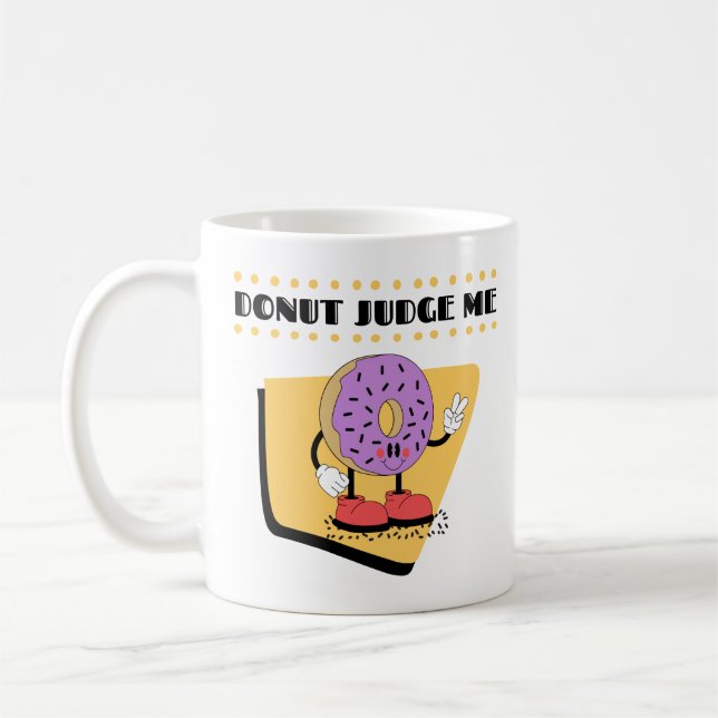 tecknad med citatet "döma mig ej". kaffemugg (Vänster)