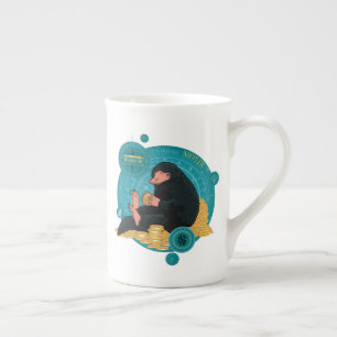 Tecknad NIFFLER™ med Guld Mynt Benporslin Mugg