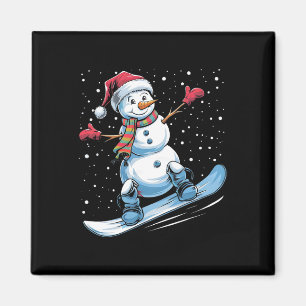 Tecknad Snowboarding Snögubbe med Santa Hat Kristu Magnet