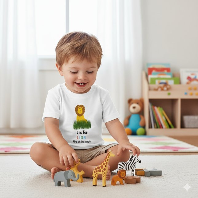 Tecknad stil L är för lejon Alfabetet Baby T-Shirt (Baby boys' "L is for Lion" t-shirt, perfect for little ones who adore jungle animals. )