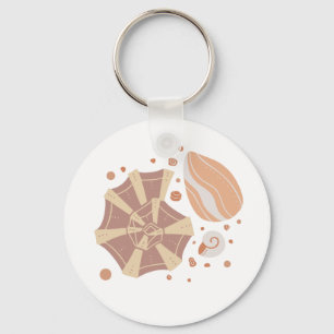 Tecknadens årskal med doodlornament nyckelring