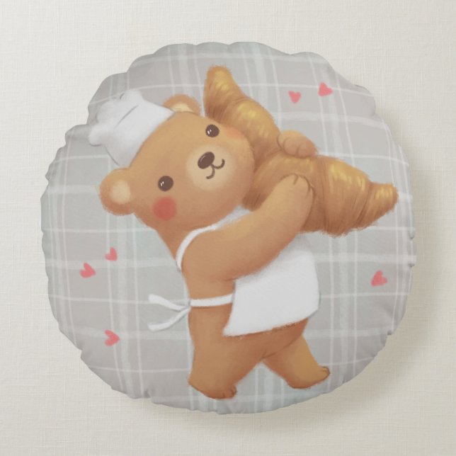 Teddy Baker med Croissant Rund Kudde (Framsidan)