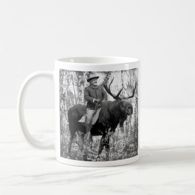 Teddy Roosevelt som rider en tjurälg Kaffemugg (Vänster)